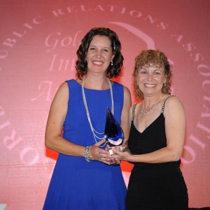 2015 Member of the Year, Terri Behling, APR, CPRC, poses with FPRA President, Rachel Smith, APR, CPRC.