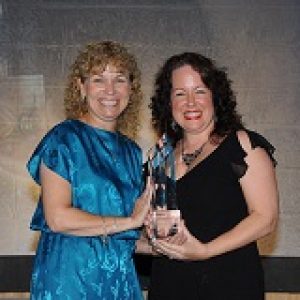 Jennifer Moss Wilson receiving award
