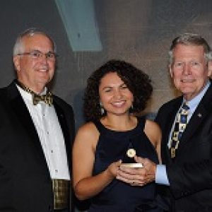 Golden Image recipient receiving pyramid award