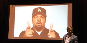 Josh Davies showing a presentation slide of Ice Cube