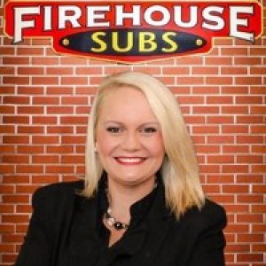 Firehouse Subs logo above a woman