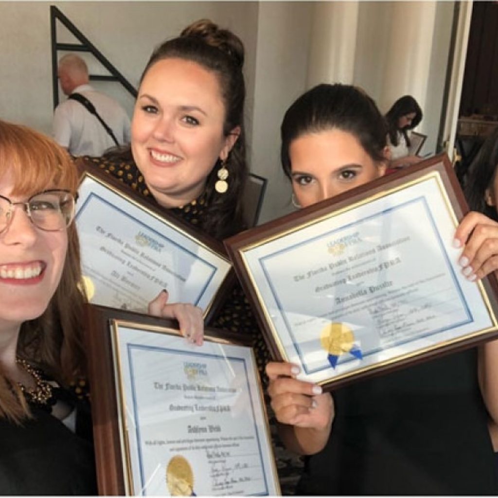 FPRA women holding up plaques at 2019 LeadershipFPRA graduation